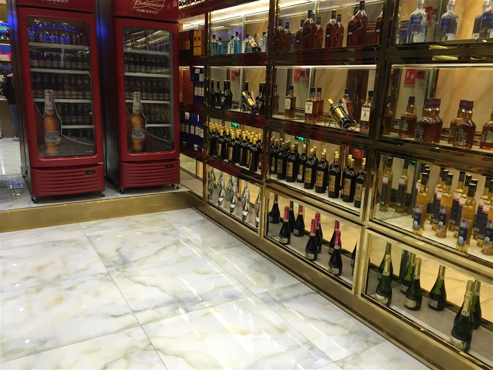 KTV公共區(qū)采用金艾陶瓷磚微晶石西班牙-翡翠玉KWD58001鋪貼